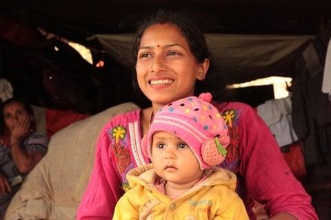 Sabita Acharya and her baby at her temporary home. ©UNFPA 