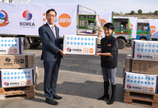 Picture shows handover of essential reproductive supplies from the Republic of Korea to UNFPA for the people of Nepal