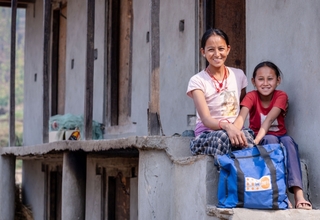  Mother and daughter with a dignity kit in Rukum West.