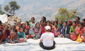 Picture depicts UNFPA engaging with the affected communities in Doti