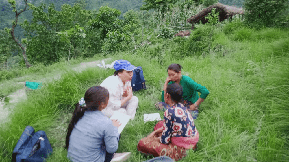 Picture depicts a CPSW speaking to a GBV survivor